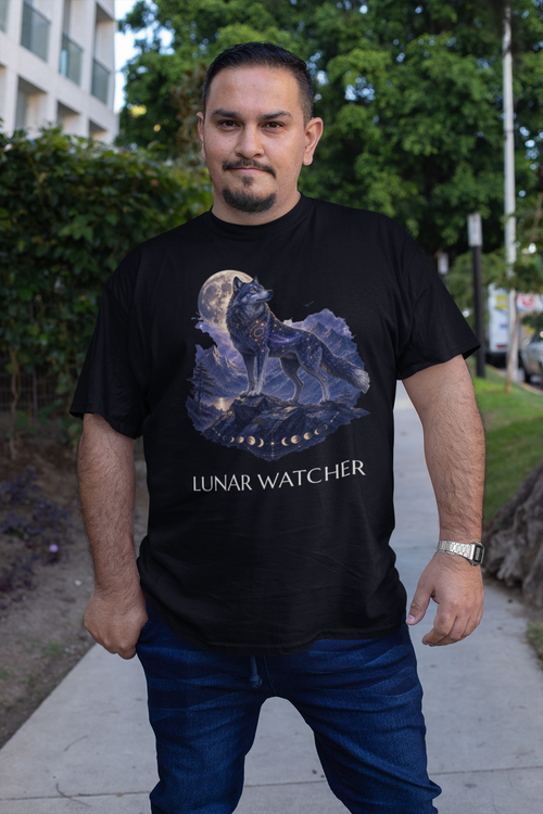 A man wearing a black graphic t-shirt with a 'Lunar Watcher' wolf design, standing outdoors on a sidewalk.